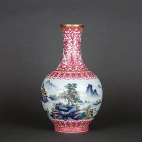 AN AGATE-RED 'INTERLOCKING FLOWERS' FAMILLE ROSE 'LANDSCAPE' VASE