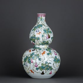 A FAMILLE ROSE 'BATS, GOURDS' GOURD SHAPED VASE