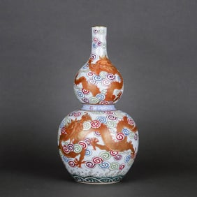 A FAMILLE ROSE 'CLOUD AND DRAGON' GOURD SHAPED VASE