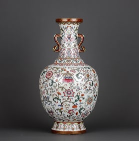 A FAMILLE ROSE 'LOTUS, EIGHT BUDDHIST EMBLEMS' VASE