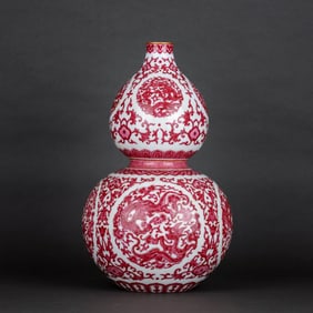 A RUBY-RED 'DRAGON ROUNDELS' GOURD SHAPED VASE