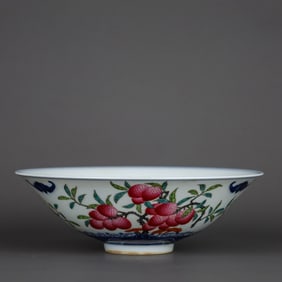 A BLUE-AND-WHITE AND FAMILLE ROSE 'THREE FRUITS' CONICAL SHAPED BOWL