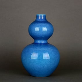 A PEACOCK-BLUE GLAZED GOURD-SHAPED VASE