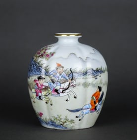 A FAMILLE ROSE 'HUNTING' RIDGED SHAPED JAR