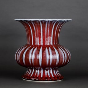 A FLAMBÉ-GLAZED RIDGED FLOWER HOLDER
