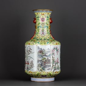 A YELLOW-GROUND FAMILLE ROSE MEDALLION ‘FLOWERS AND LANDSCAPE' VASE