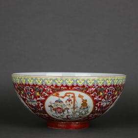 A RUBY-RED GROUND FAMILLE ROSE MEDALLION 'ANTIQUITIES' BOWL