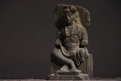 A GANDHARAN SEATED FIGURE