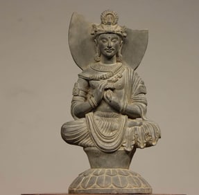 A GANDHARAN SEATED FIGURE