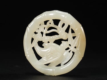 A JADE 'FLOWER-BIRD' PENDANT