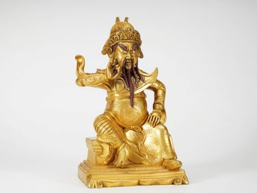 A GILT COPPER 'GUAN YU' FIGURE