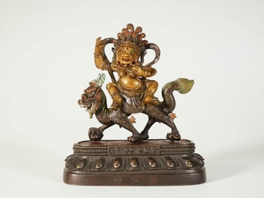 A WHITE JAMBALA FIGURE