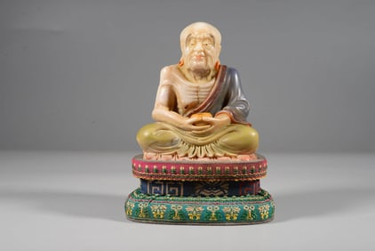 A SHOUSHAN STONE 'EMACIATED LUOHAN' FIGURE