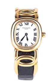 PATEK PHILIPPE 18K GOLD QUARTZ WRISTWATCH