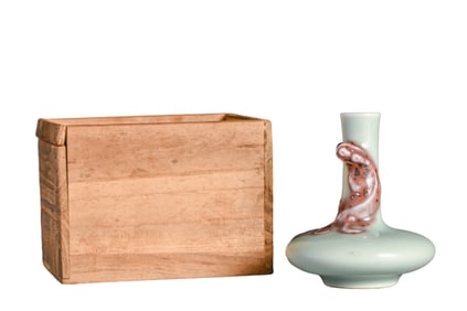 A PALE CELADON-GLAZED 'DRAGONS' SMALL VASE