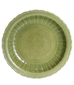 A LONGQUAN CELADON INCISED 'FRUIT AND FLOWER' DISH