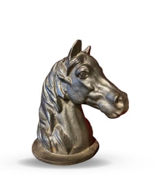 AN IRON HORSE HEAD ORNAMENT
