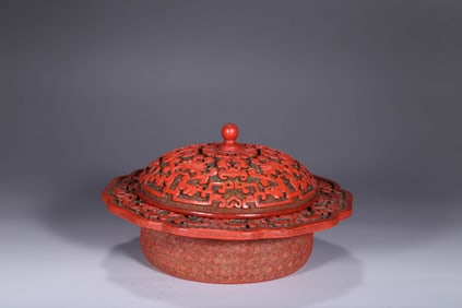 A CARVED CINNABAR LACQUER ZHADOU AND COVER