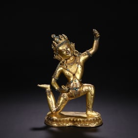 A GILT-BRONZE STATUE OF ACALANATHA