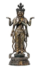 A GILT-BRONZE SIX-ARMED AVALOKITESHVARA
