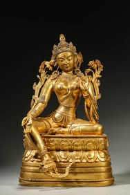 A GILT-BRONZE FIGURE OF TARA