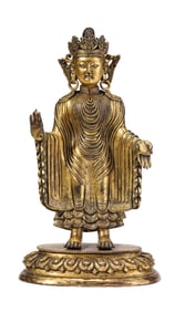 A GILT-BRONZE FIGURE OF SANDALWOOD BUDDHA