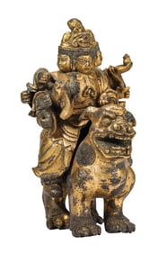 A GILT-BRONZE FIGURE OF HEAVENLY GUARDIAN