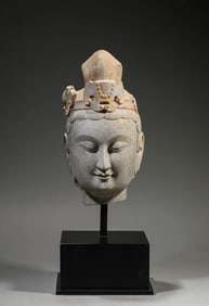 A STONE BUDDHA HEAD