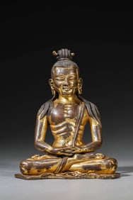 A GILT-BRONZE FIGURE OF BUDDHA