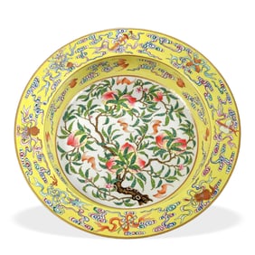 A FAMILLE ROSE YELLOW-GROUND 'PEACH AND BAT' DISH