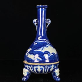 A SACRIFICIAL-BLUE GLAZED WITH RESERVED 'CLOUD AND PHOENIX' VASE