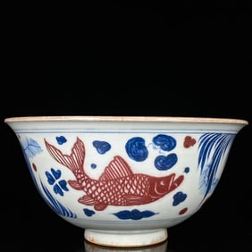 A BLUE AND WHITE WITH UNDERGLAZED RED 'FISH AND AQUATIC PLANTS' BOWL