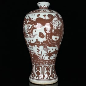 AN UNDERGLAZED RED 'DRAGON' MEIPING