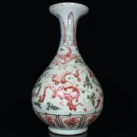 A BLUE AND WHITE WITH UNDERGLAZED RED 'LION PLAYING WITH BROCADE BALL' YUHUCHUNPING