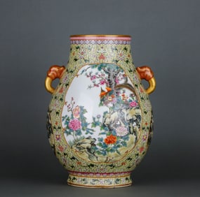 A YELLOW-GROUND FAMILLE ROSE MEDALLION 'FLOWERS AND BIRDS' VASE