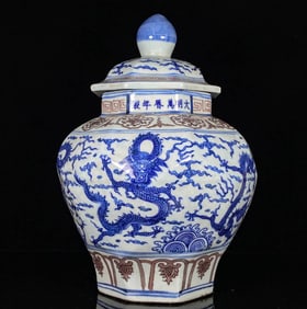 A BLUE AND WHITE WITH UNDERGLAZED RED 'DRAGON' COVERED JAR