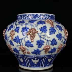 A BLUE AND WHITE WITH UNDERGLAZED RED 'GRAPE' JAR