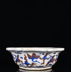 A BLUE AND WHITE WITH UNDERGLAZED RED 'CLOUD AND PHOENIX' WASHER