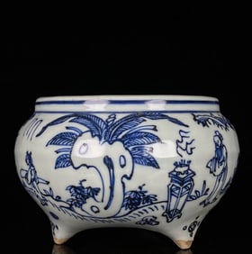 A BLUE AND WHITE 'FIGURES' TRIPOD CENSER