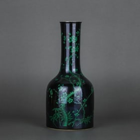 A BLACK-GROUND 'PLUM AND BAMBOO' BELL-SHAPED VASE