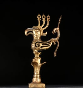 A GILT-DECORATED-BRONZE 'PHOENIX' ORNAMENT