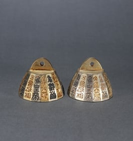 A PAIR OF GILT-DECORATED-BRONZE SCALE WEIGHTS