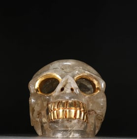 A CRYSTAL AND GOLD-OVERLAID SKULL