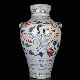 A BLUE AND WHITE WITH UNDERGLAZED RED 'PHOENIX AMONG PEONY' VASE