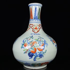 A WUCAI 'FLOWERS AND BIRDS' VASE
