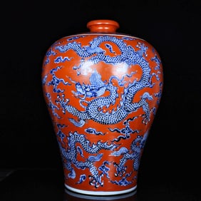 A RED-GROUND BLUE AND WHITE 'FIVE DRAGONS' MEIPING