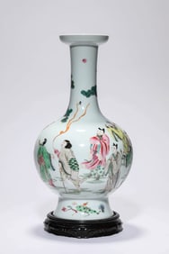 A FAMILLE-ROSE 'EIGHT IMMORTALS OFFERING LONGEVITY' VASE