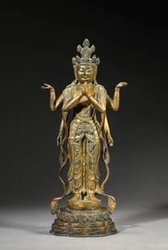 A GILT-BRONZE SIX-ARMED AVALOKITESHVARA