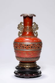 A CORAL-RED GROUND GILDED OPENWORK VASE
