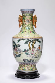 A FAMILLE-ROSE 'LONGEVITY AND FIGURE' VASE